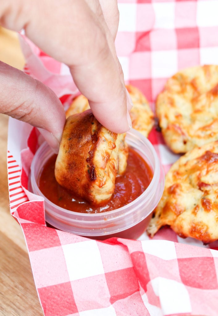 pizza muffin dipped in sauce