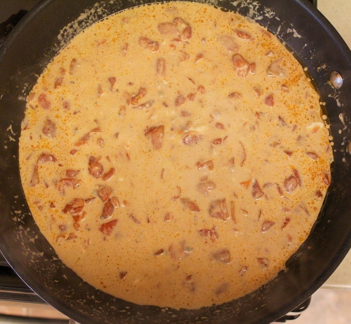 creamy tomato blue cheese sauce in skillet