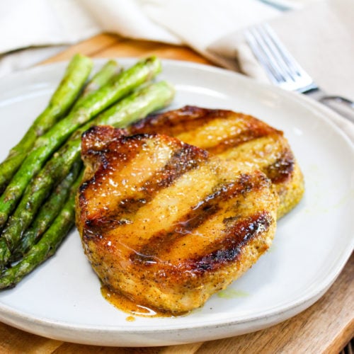 Pork chops on a white plate