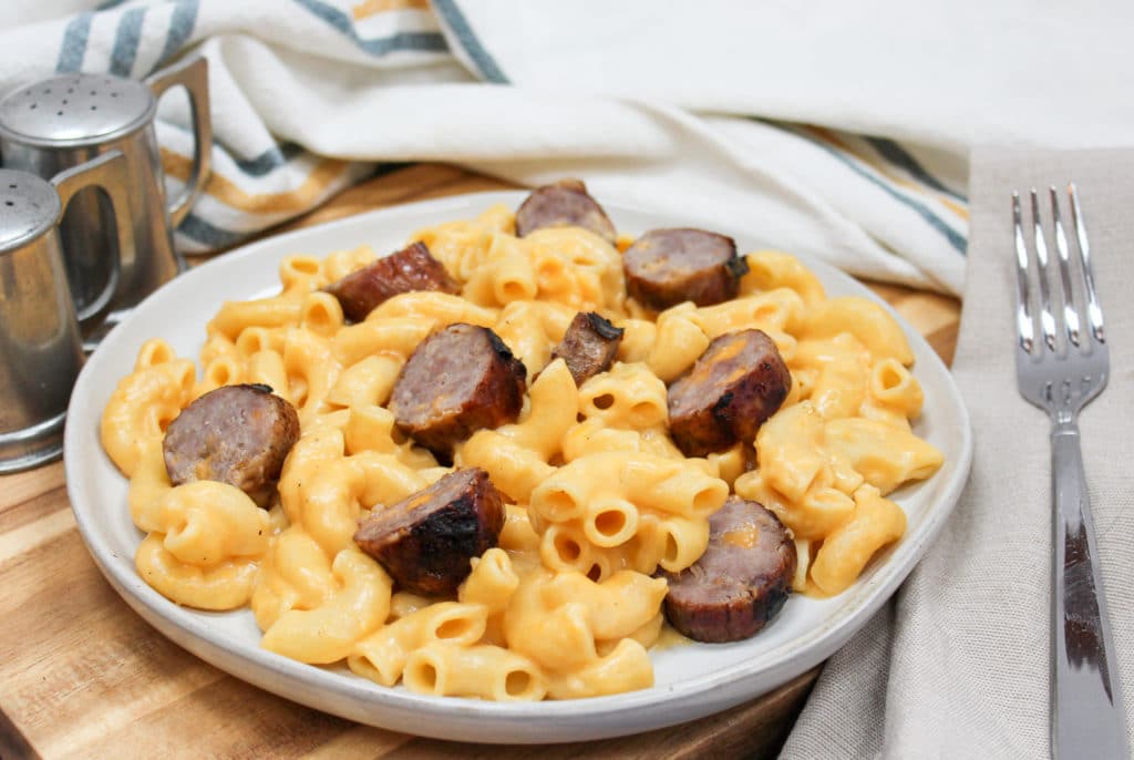 pasta and brats on a plate