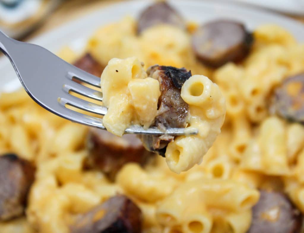 pasta and brats on a plate