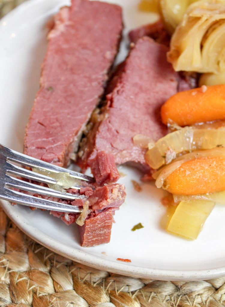 sliced corned beef on a plate