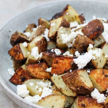 Roasted Potatoes with Lemon, Oregano and Feta in a bowl