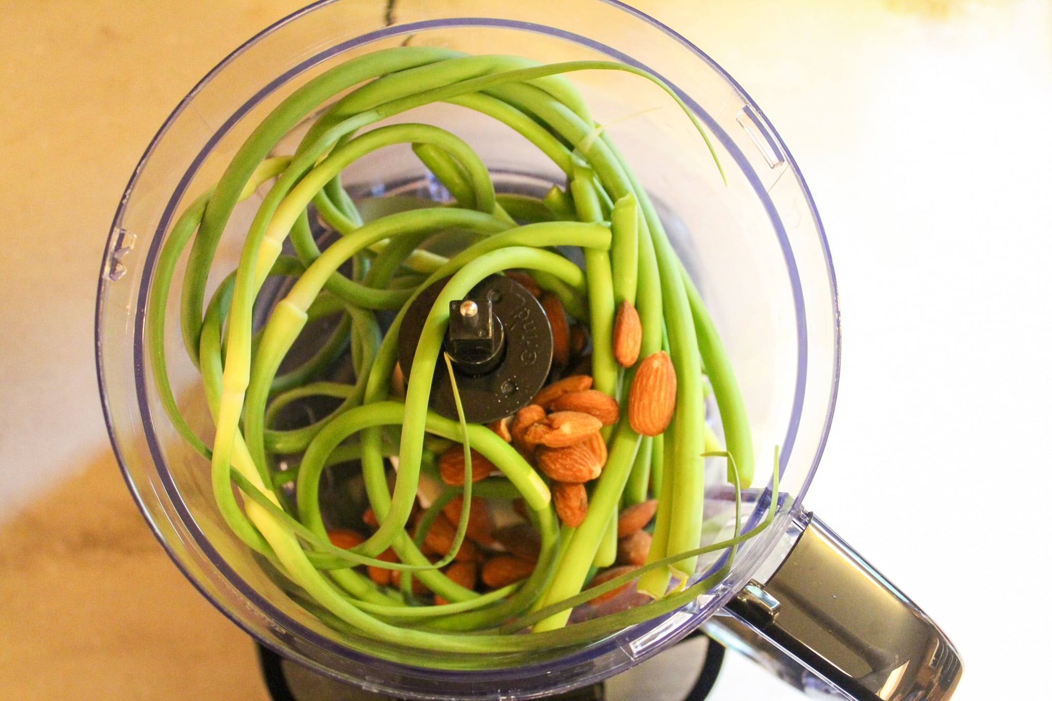 scapes and almonds in food processor