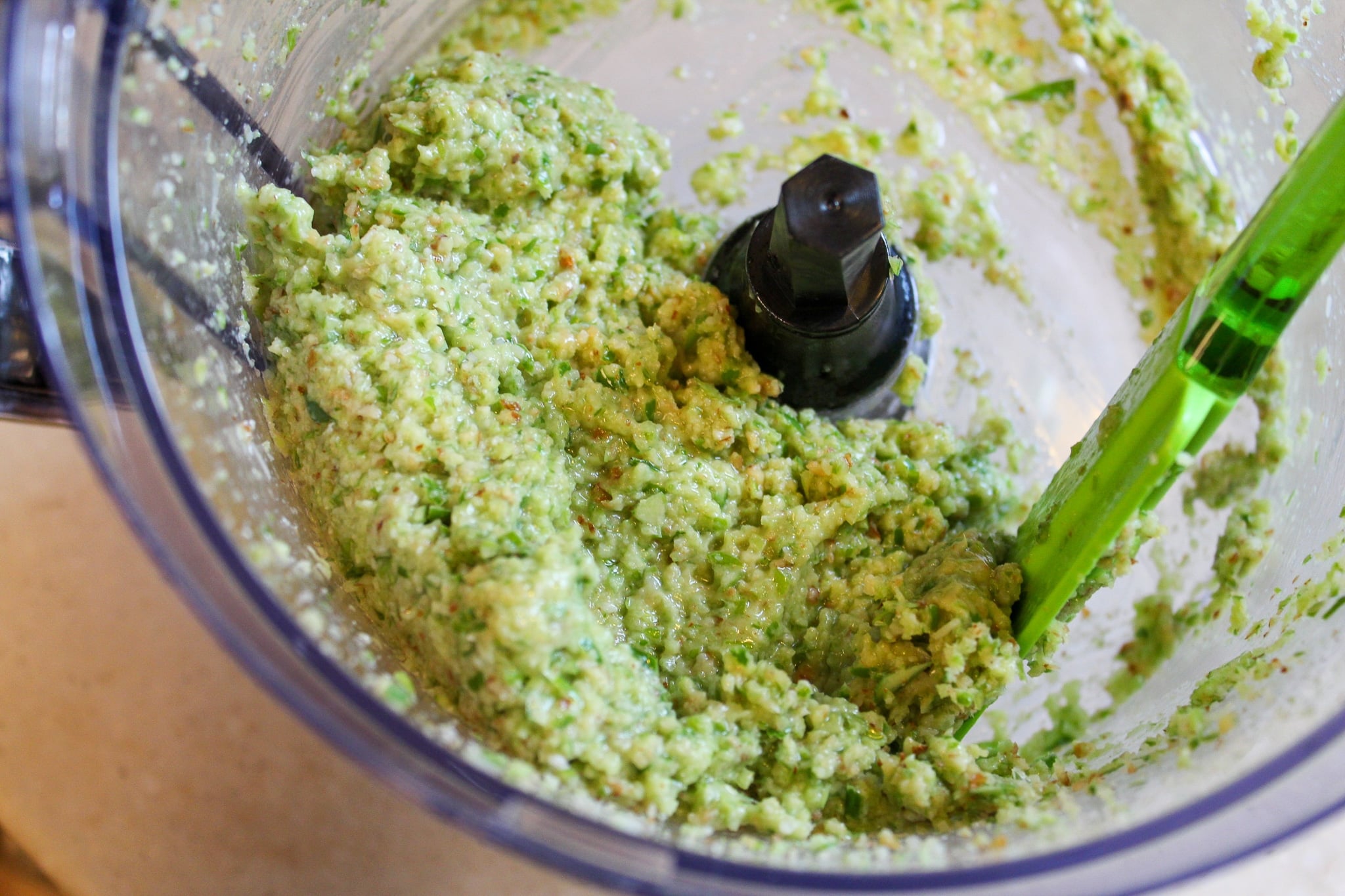 scapes and almonds in food processor blended