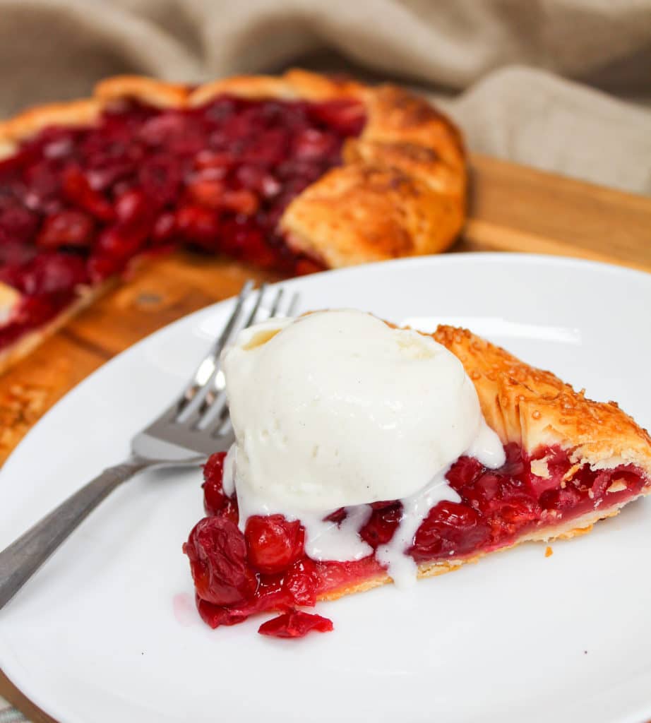 Plated galette with a scoop of vanilla ice cream
