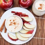 apple cider dip in a bowl with sliced apples