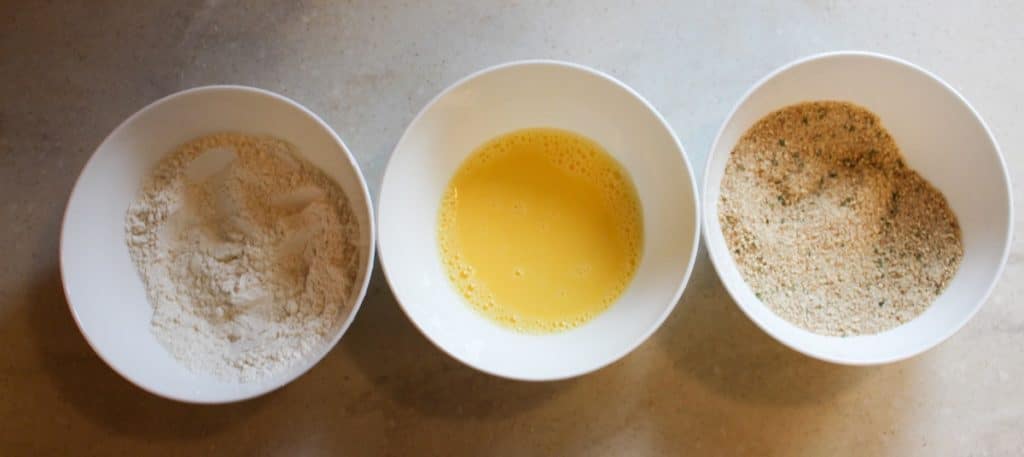 breading stations: four, egg, and bread crumbs
