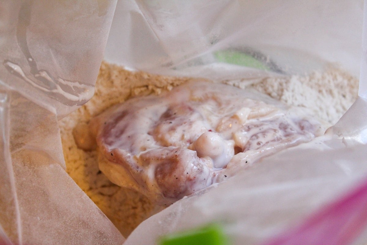 chicken in bag with buttermilk marinate