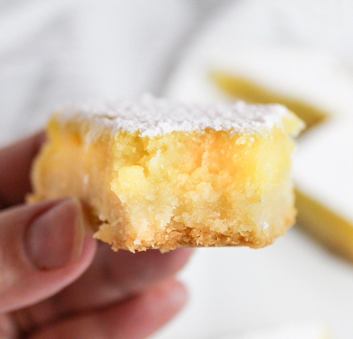 meyer lemon bar with a bite