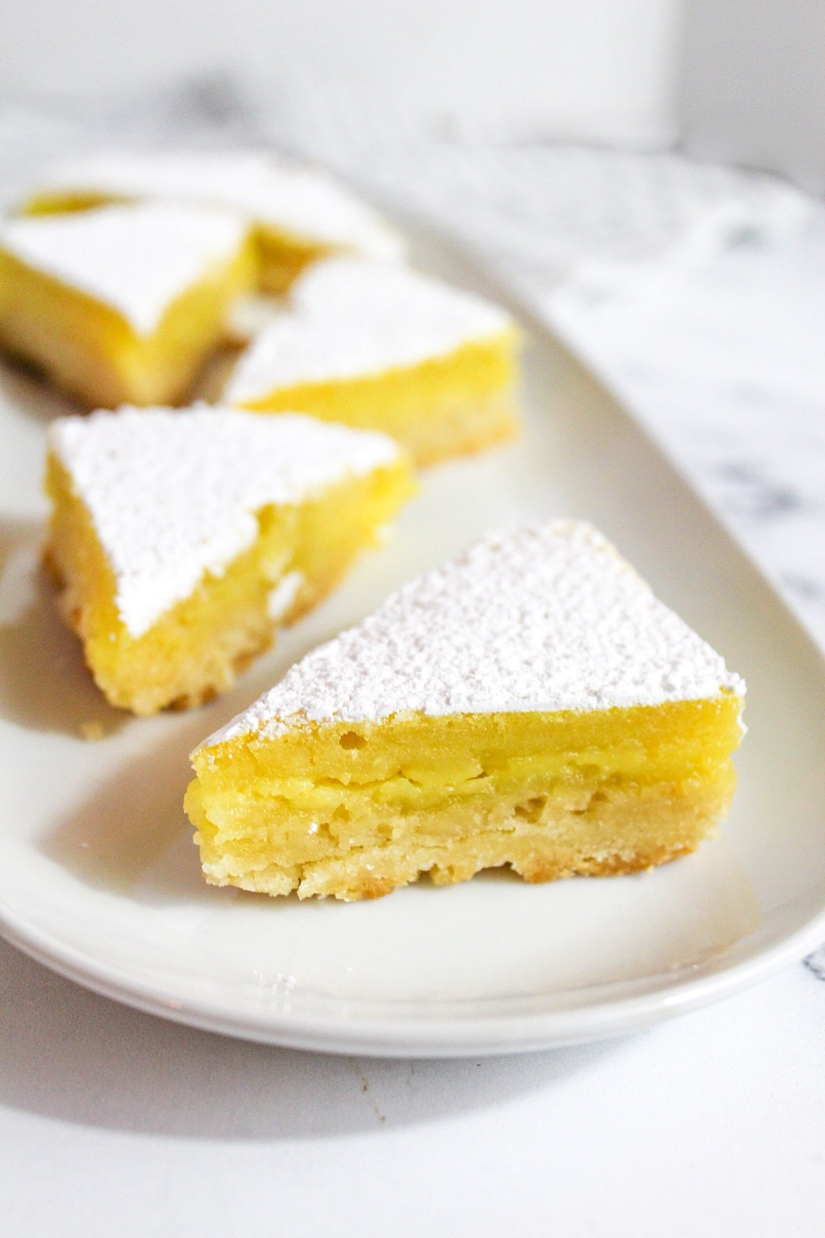 lemon bars on a plate