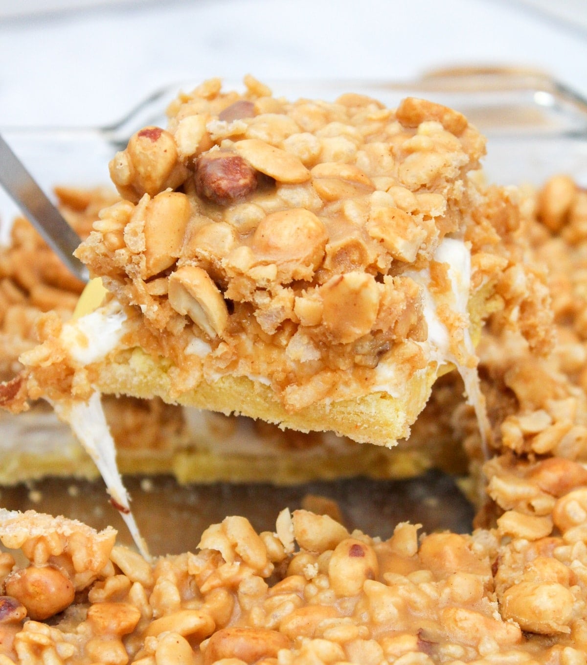 salted nut roll bar scooped from pan