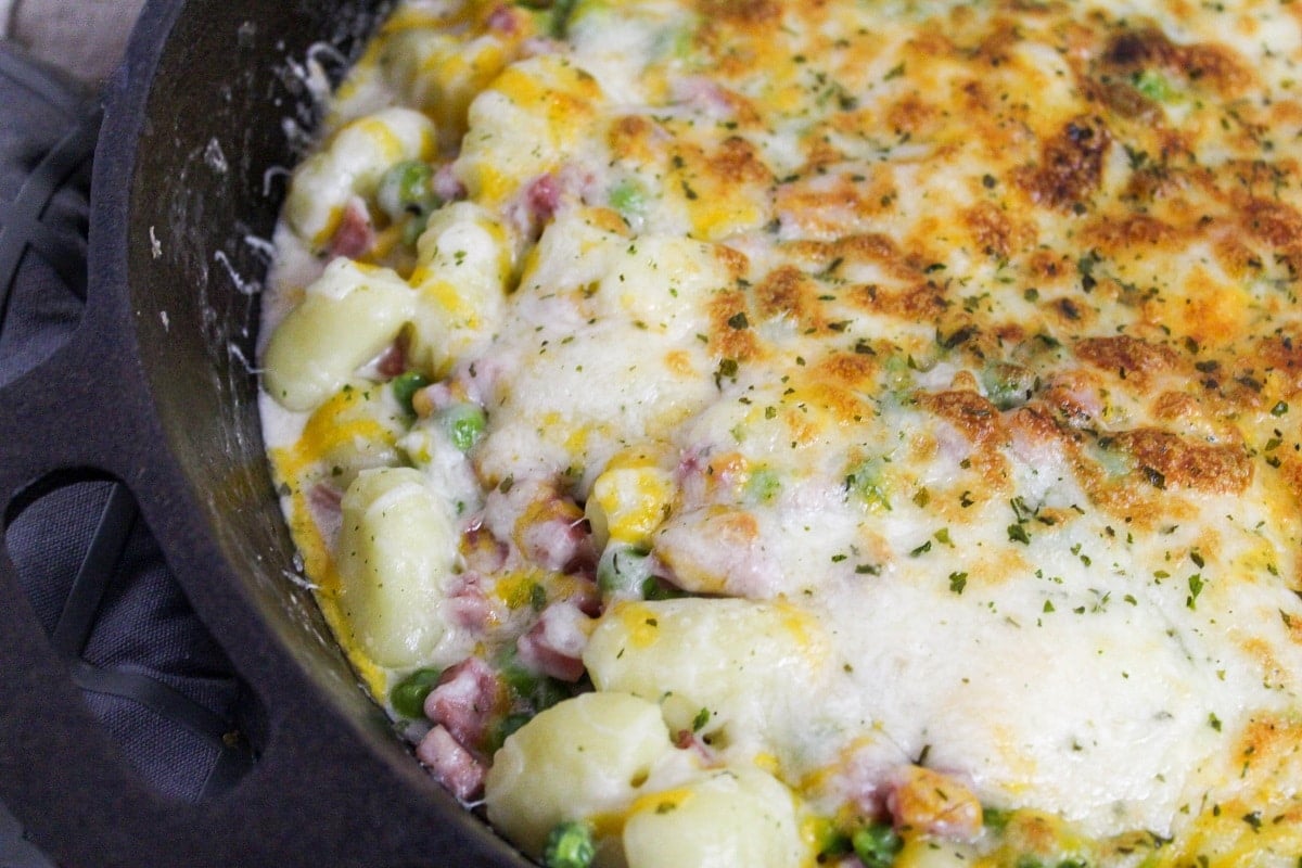 prep photos for ham and cheese gnocchi in cast iron skillet