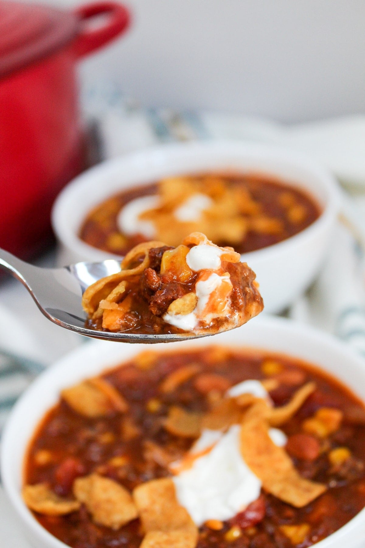 soup in a white bowl with a spoon