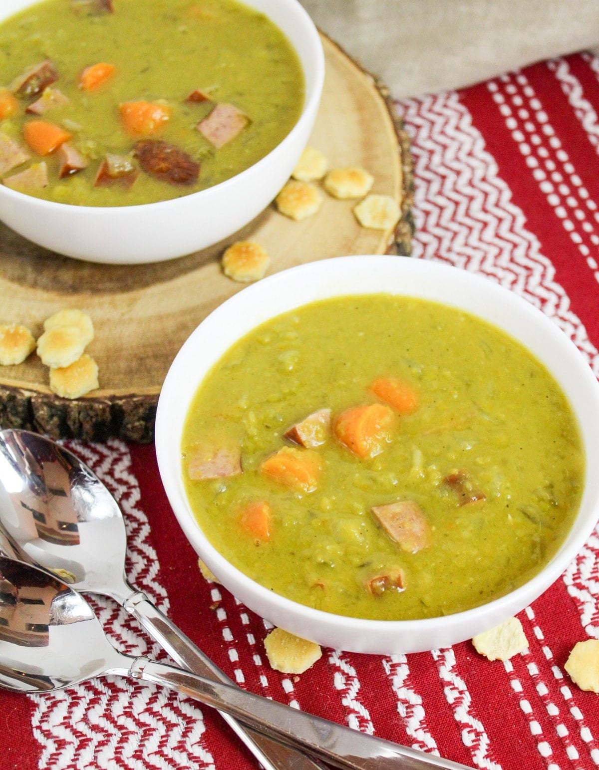 split pea and kielbasa soup in a white bowl