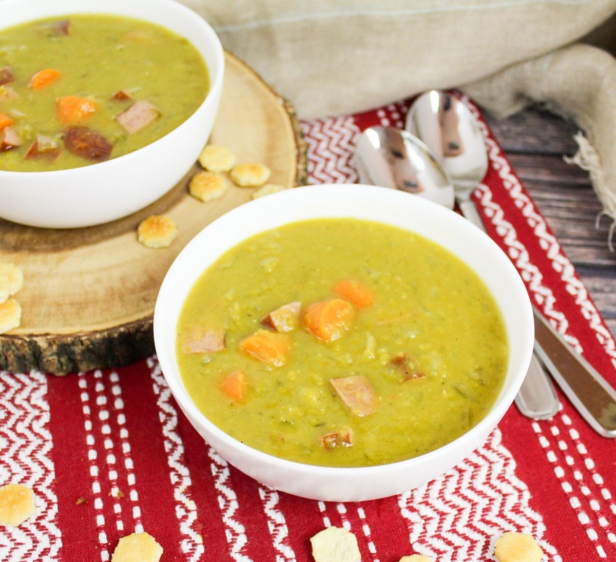 split pea and kielbasa soup in a white bowl