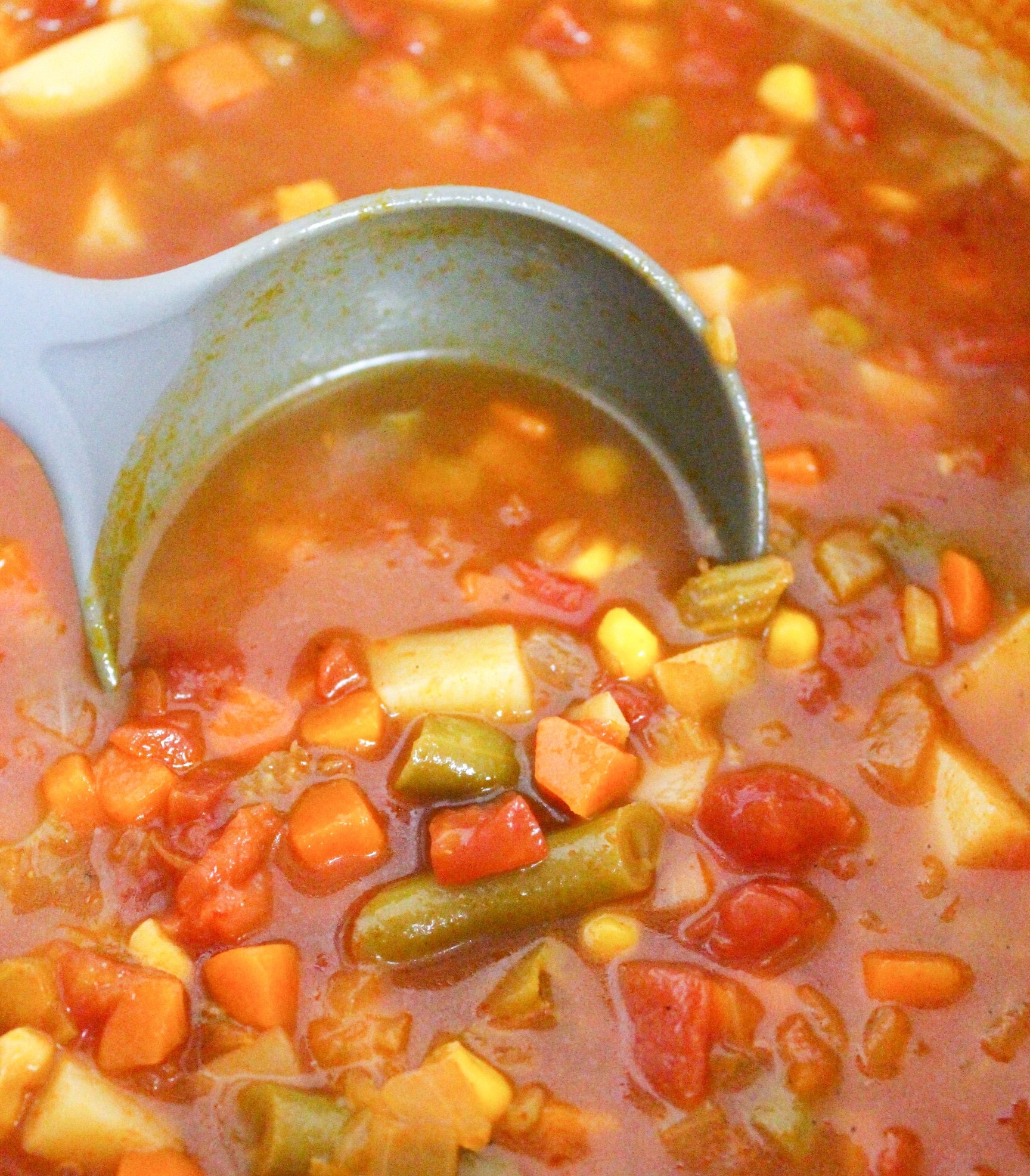 soup scooped on a ladle