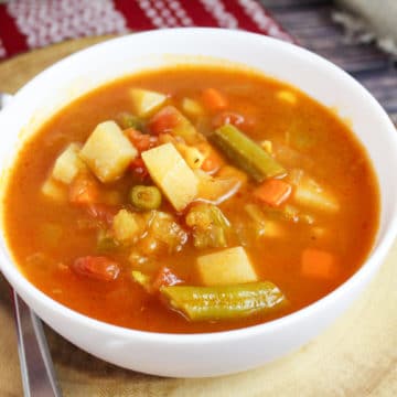 veggie soup in white bowl