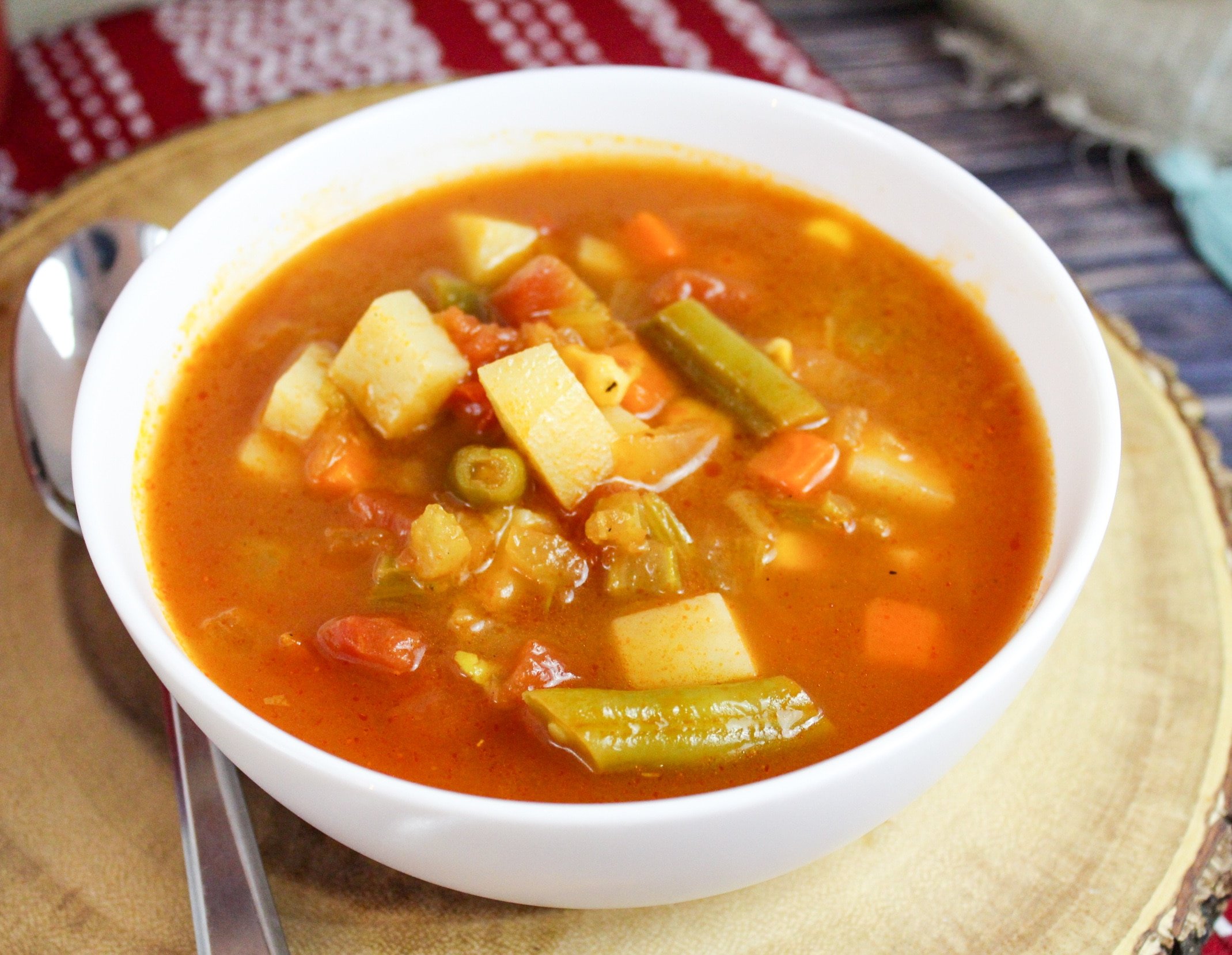 veggie soup in white bowl