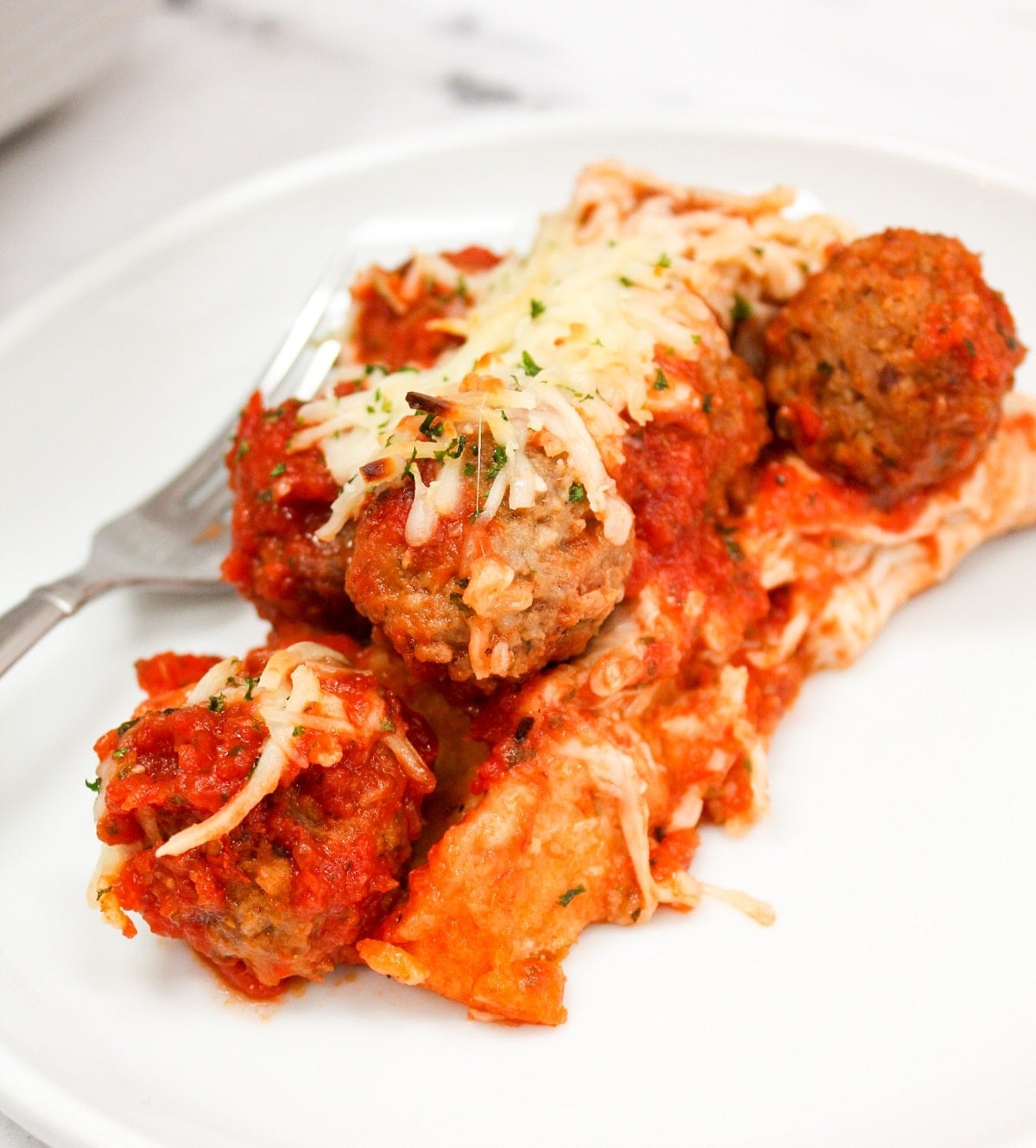 meatball sub casserole on a white plate