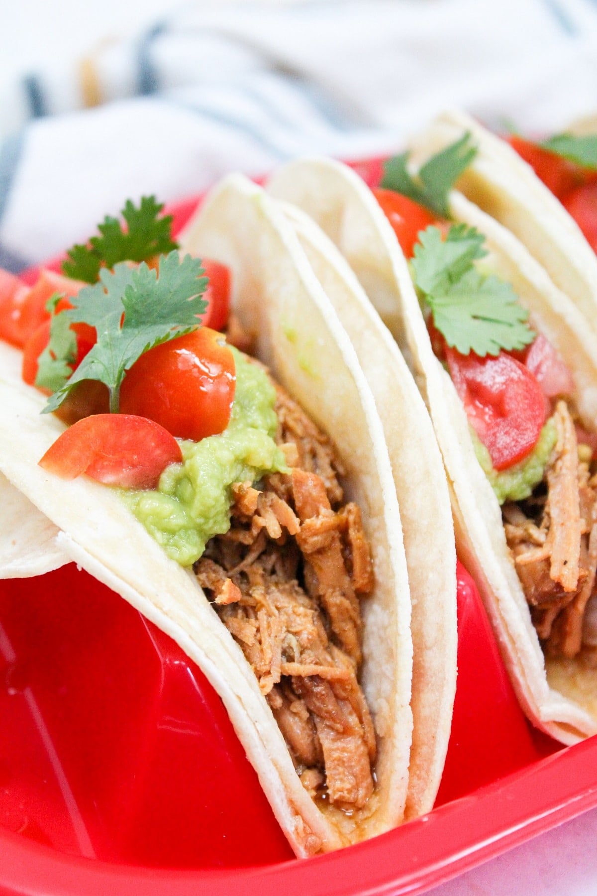 Honey Chili Lime Pork tacos on a red plate