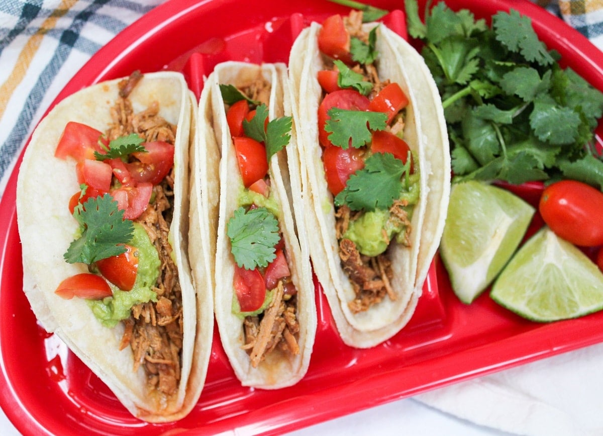 Honey Chili Lime Pork tacos on a red plate