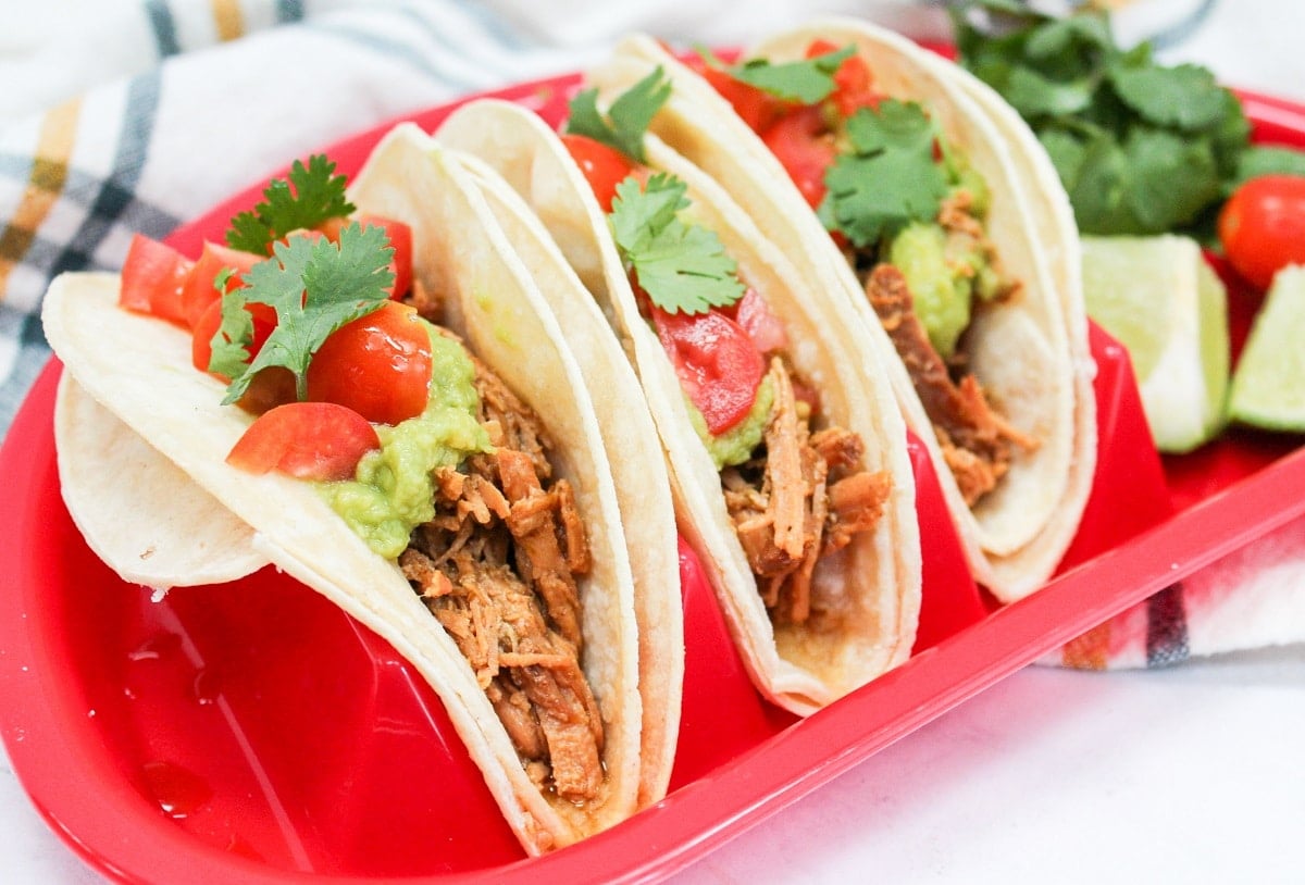 Honey Chili Lime Pork tacos on a red plate
