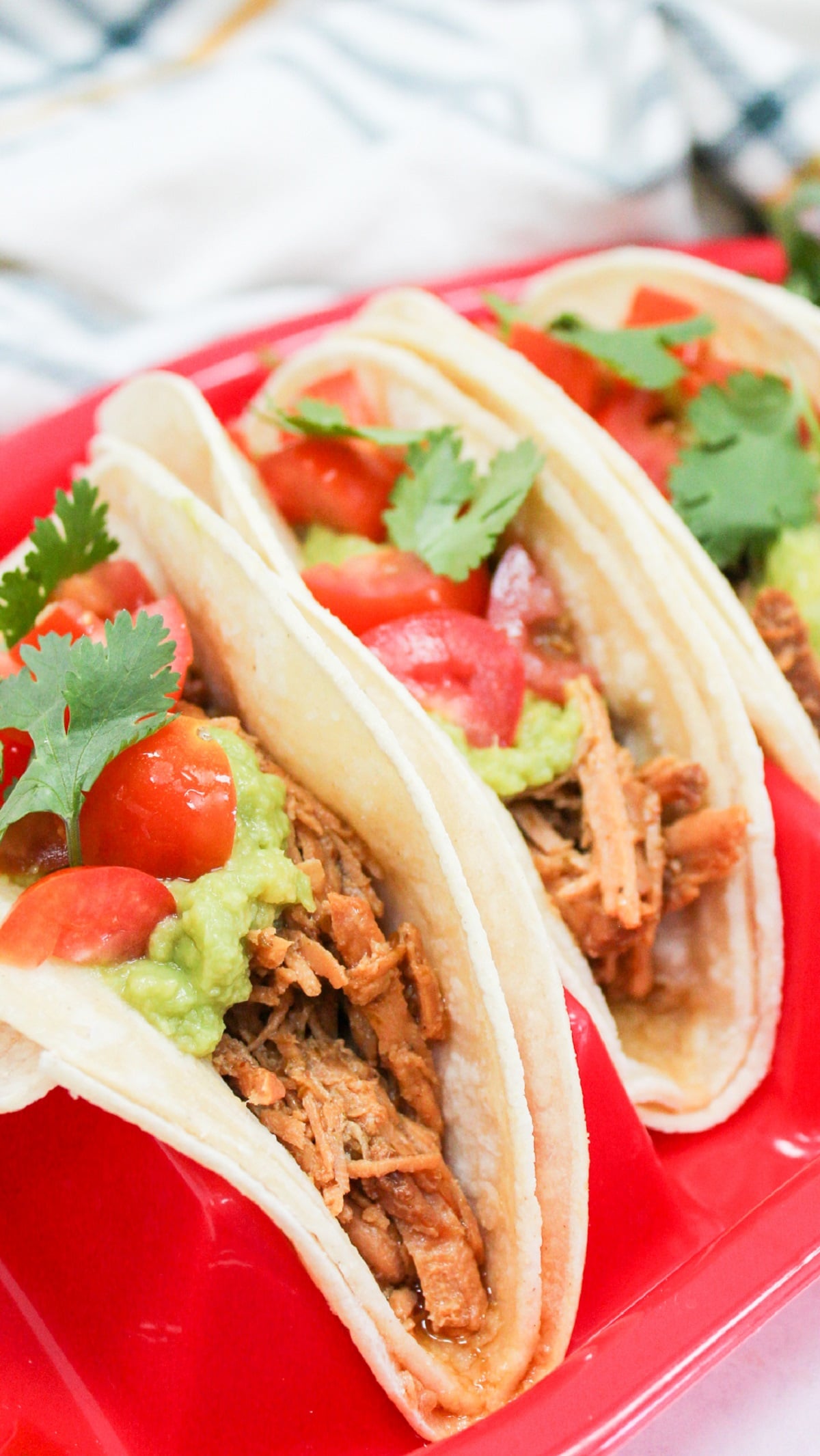 Honey Chili Lime Pork tacos on a red plate