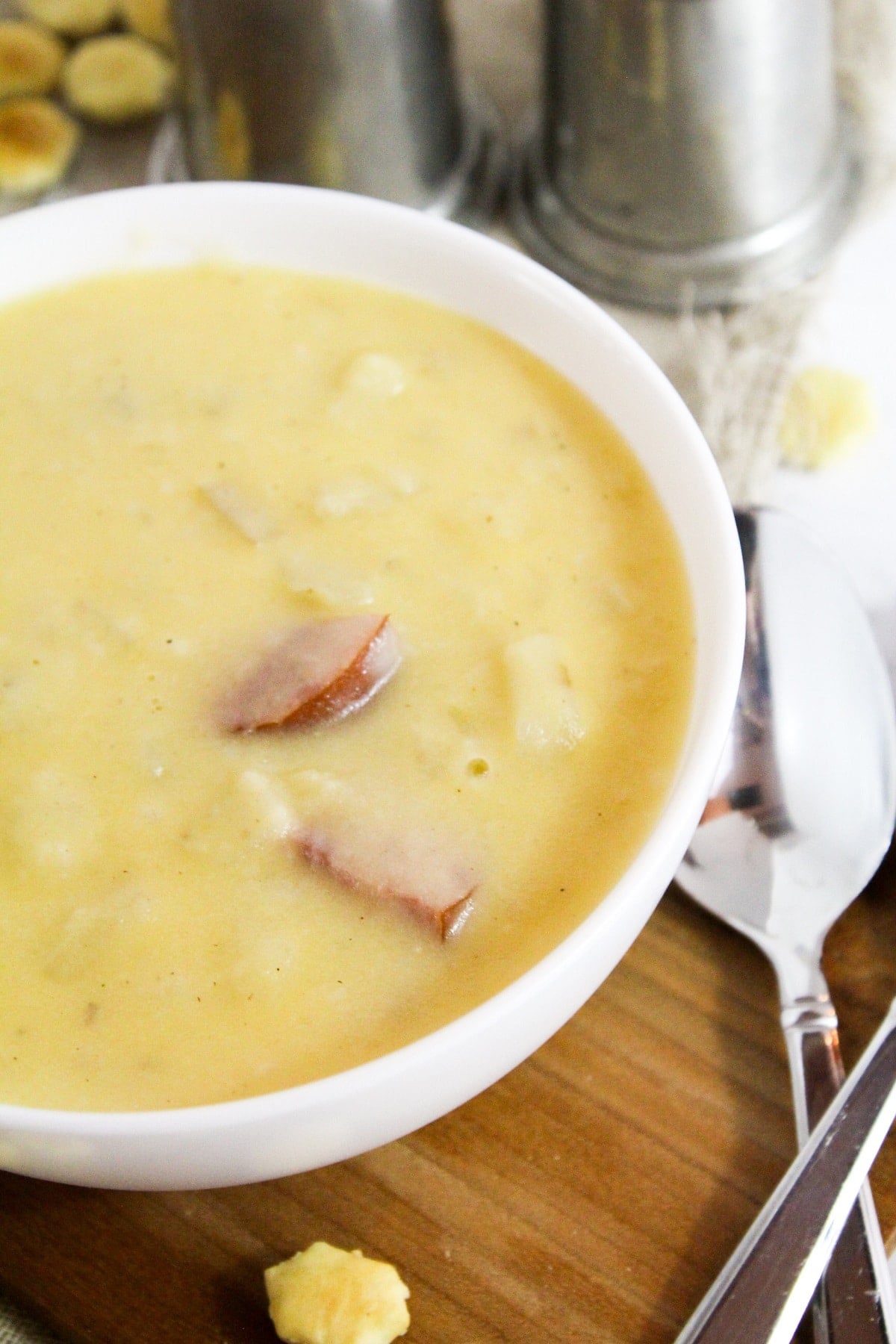 close photo of soup with spoon on side of the bowl