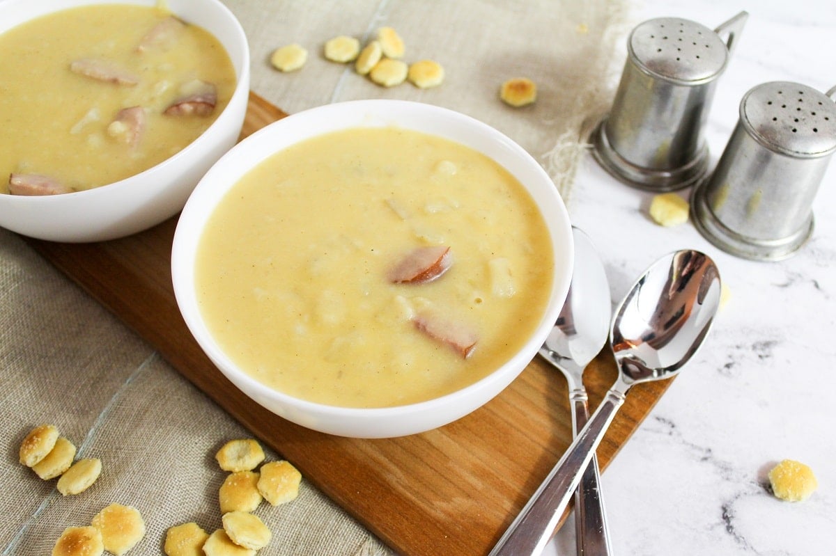 bowl of soup with spoons on side