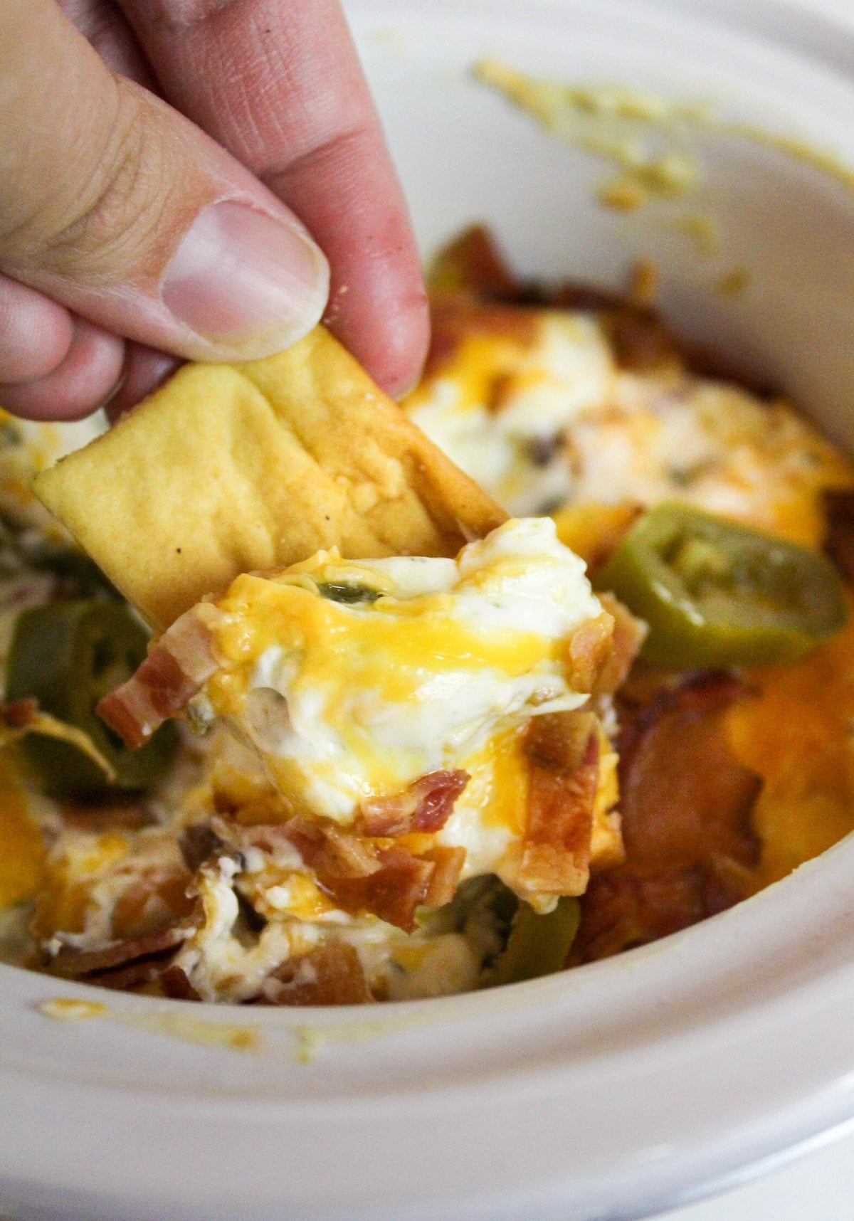 slow cooker jalapeno popper dip with chip
