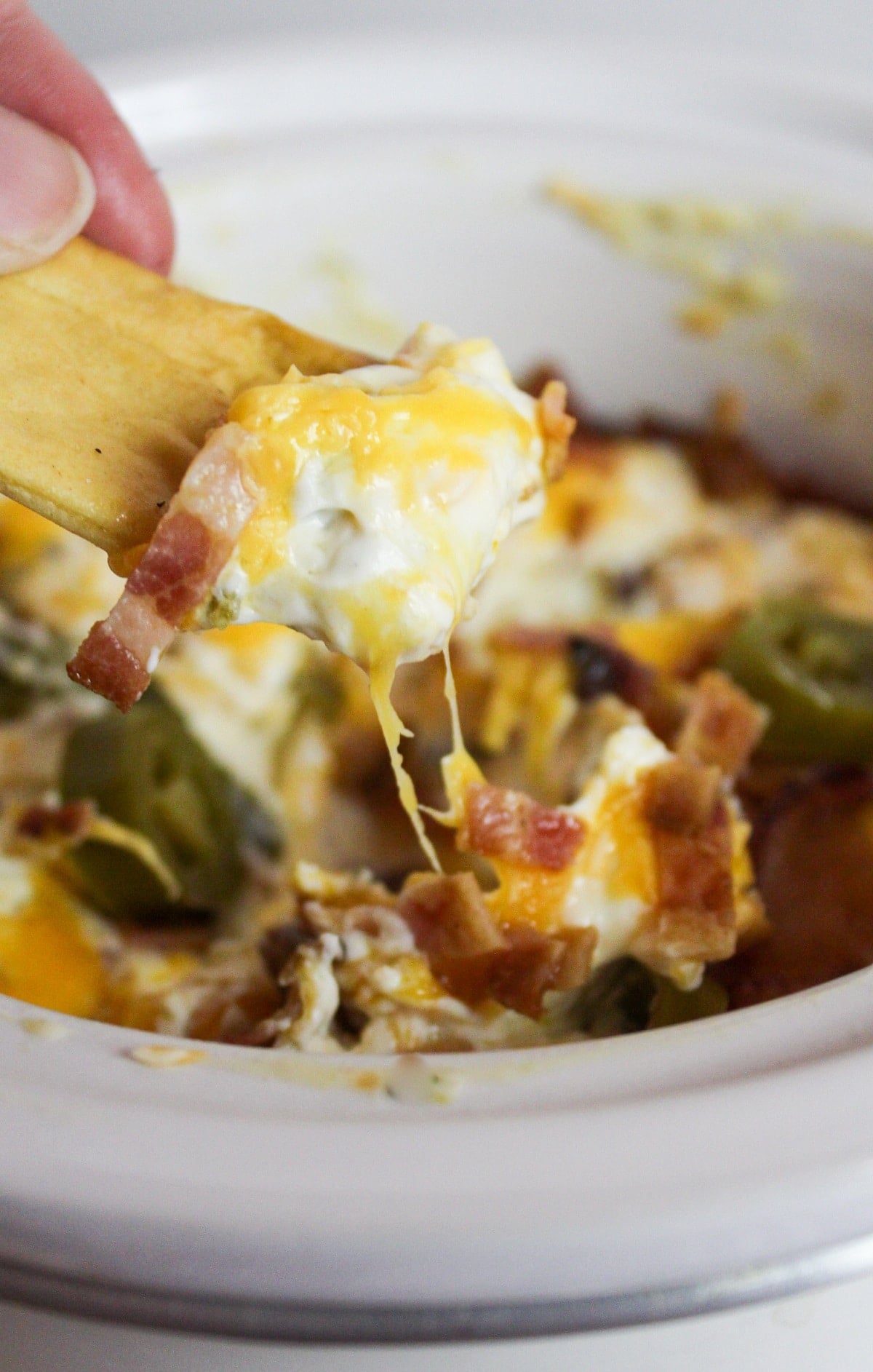 slow cooker jalapeno popper dip with chip