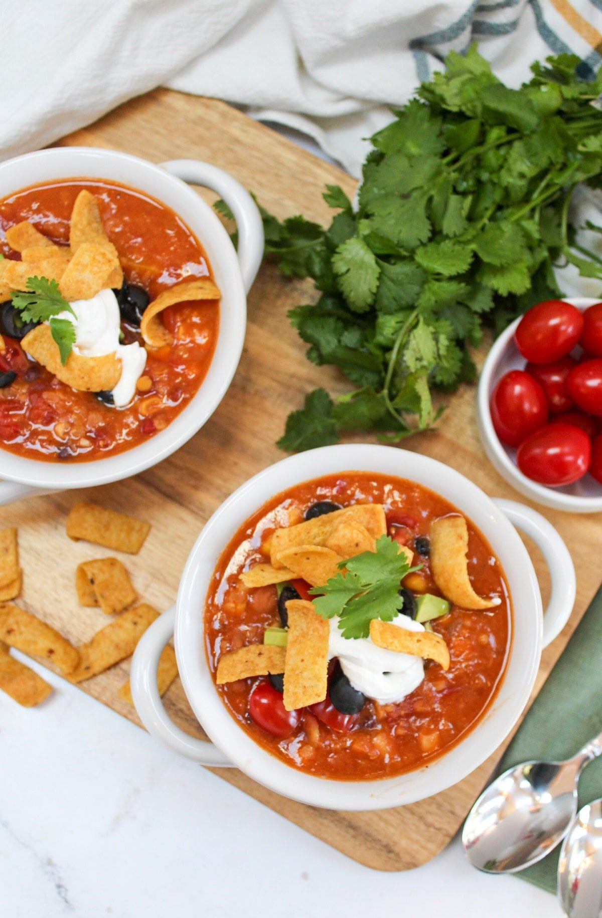 instant pot vegetarian lentil tortilla soup in a white bowl