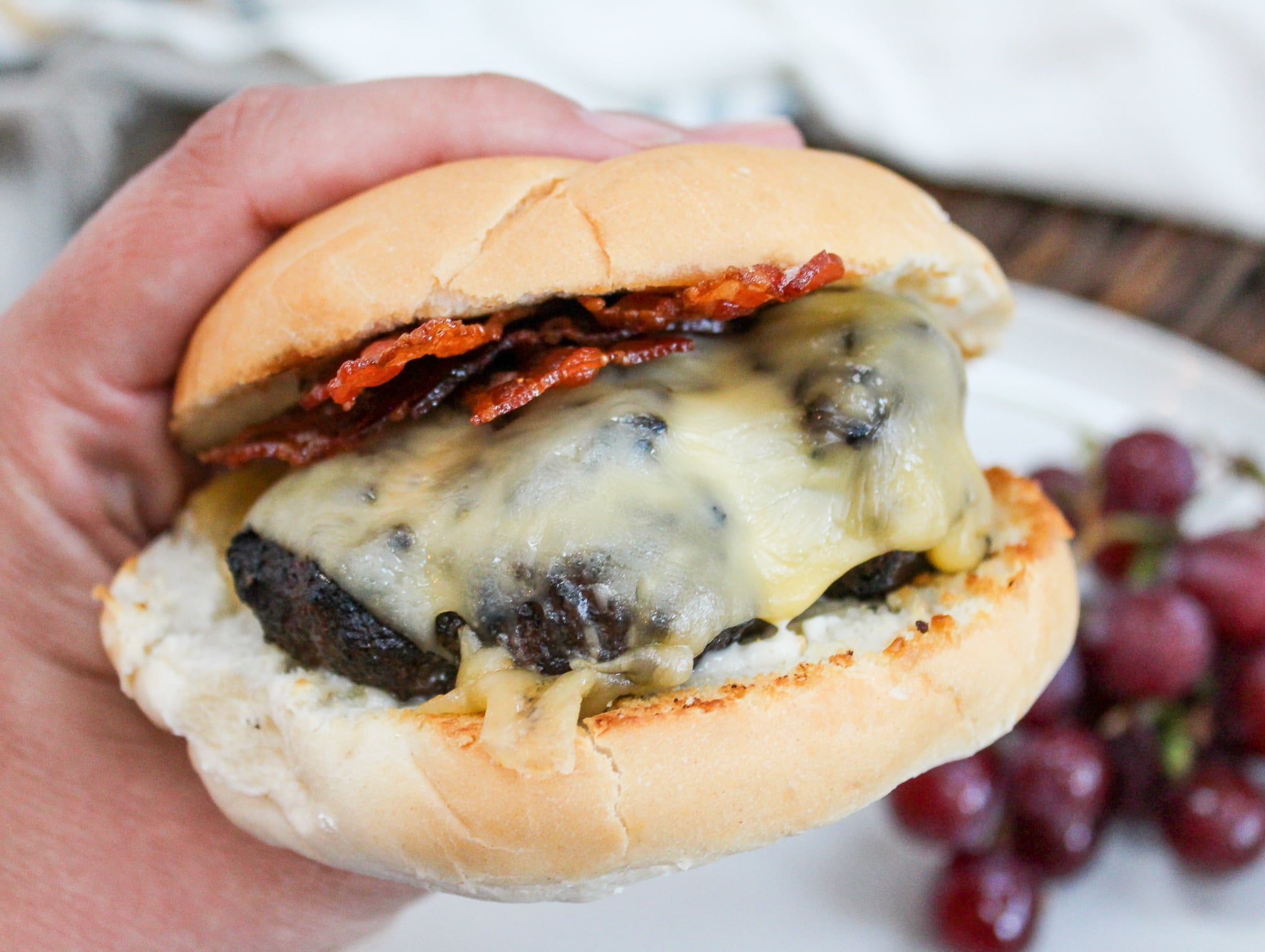 burger held in hand