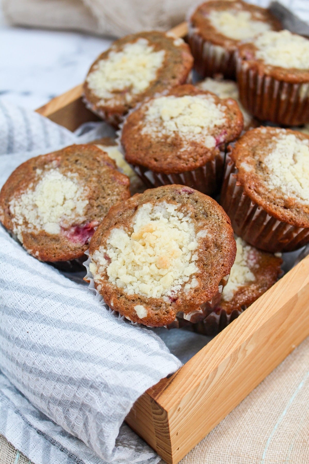 tart cherry crumb muffins in a basket