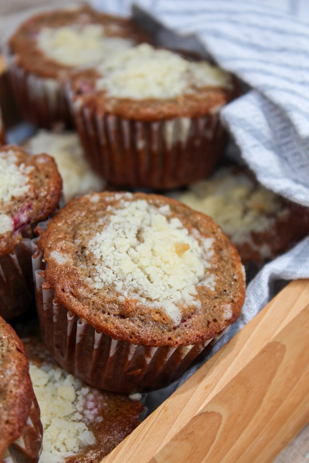 tart cherry crumb muffins in a basket