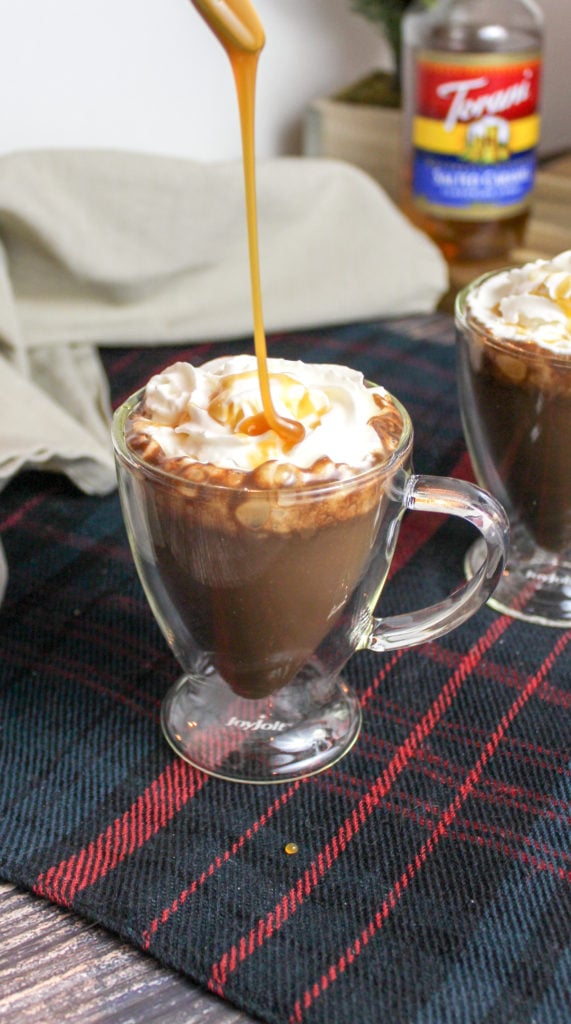 hot chocolate in a glass mug