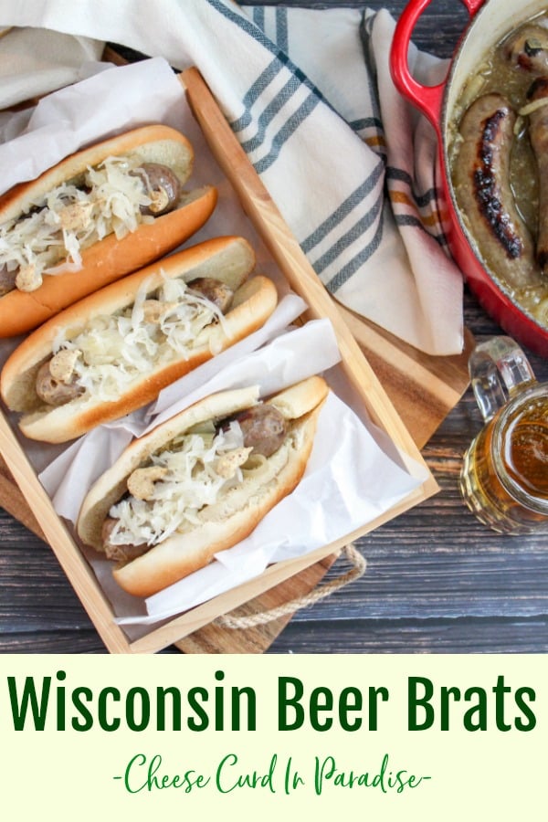 brats in buns on a wood platter