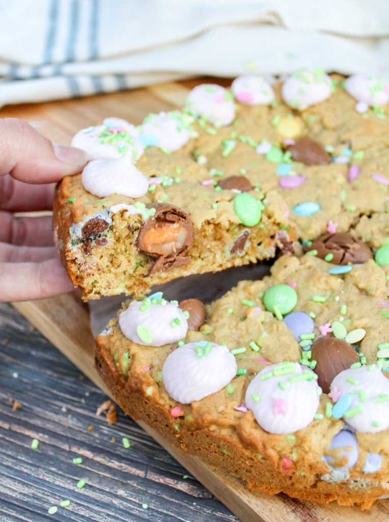 cookie cake on a tray and cut into wedges