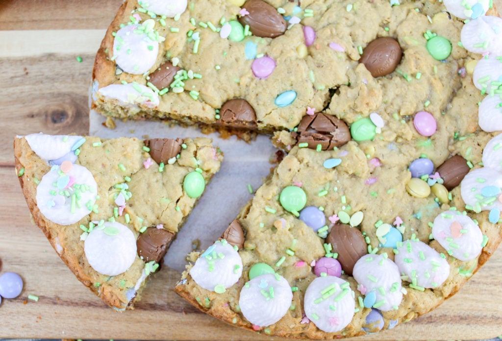 cookie cake on a tray and cut into wedges