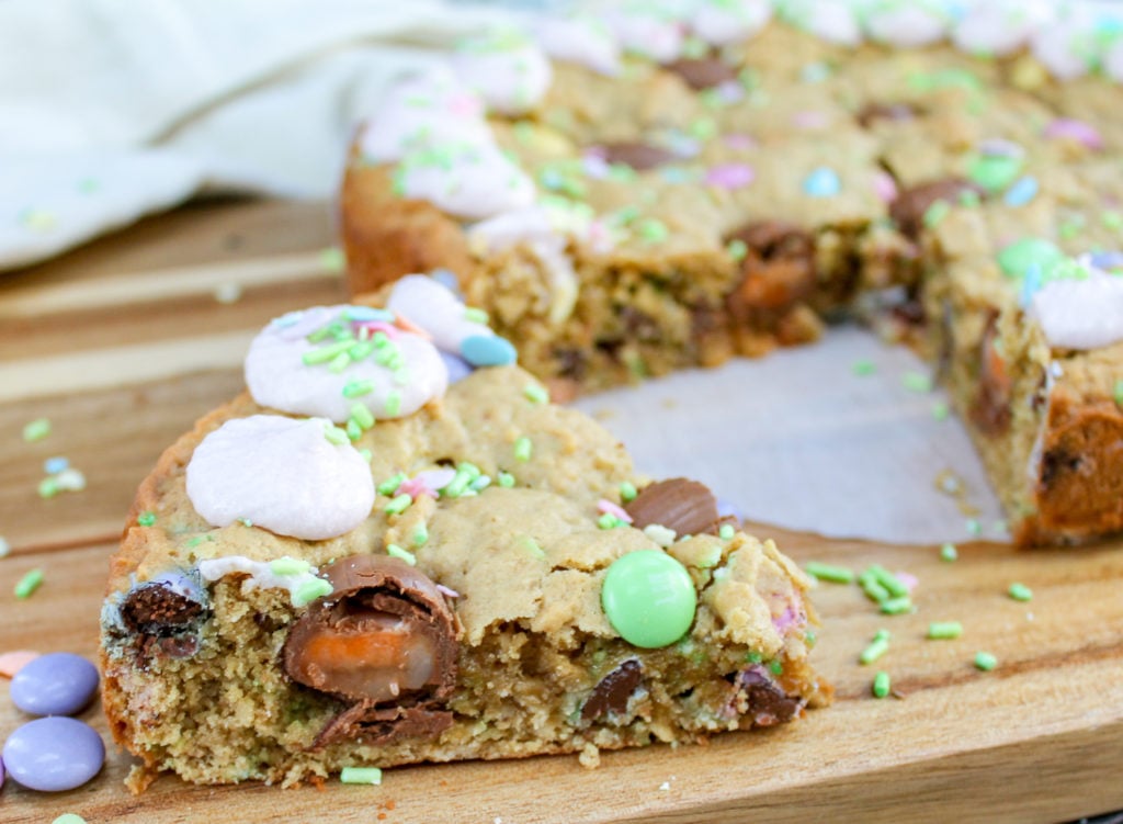 cookie cake on a tray and cut into wedges