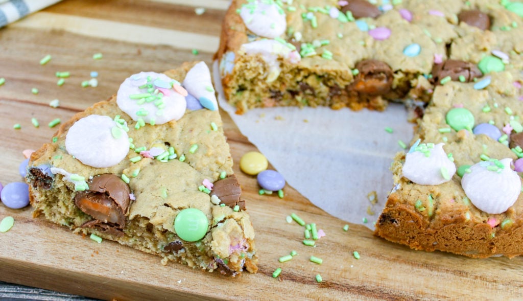 cookie cake on a tray and cut into wedges