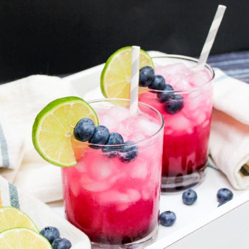 two margaritas on a tray