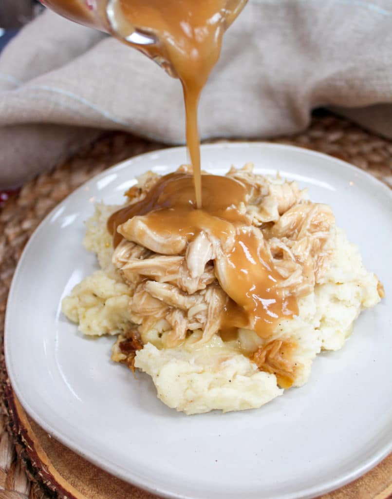 turkey and gravy over potatoes