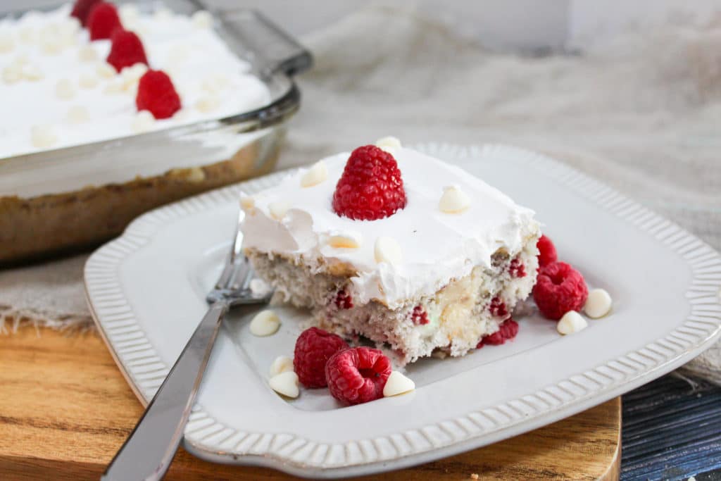 straight view of Raspberry White Chocolate Poke Cake