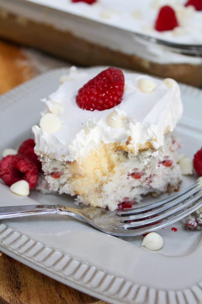 fork with Raspberry White Chocolate Poke Cake