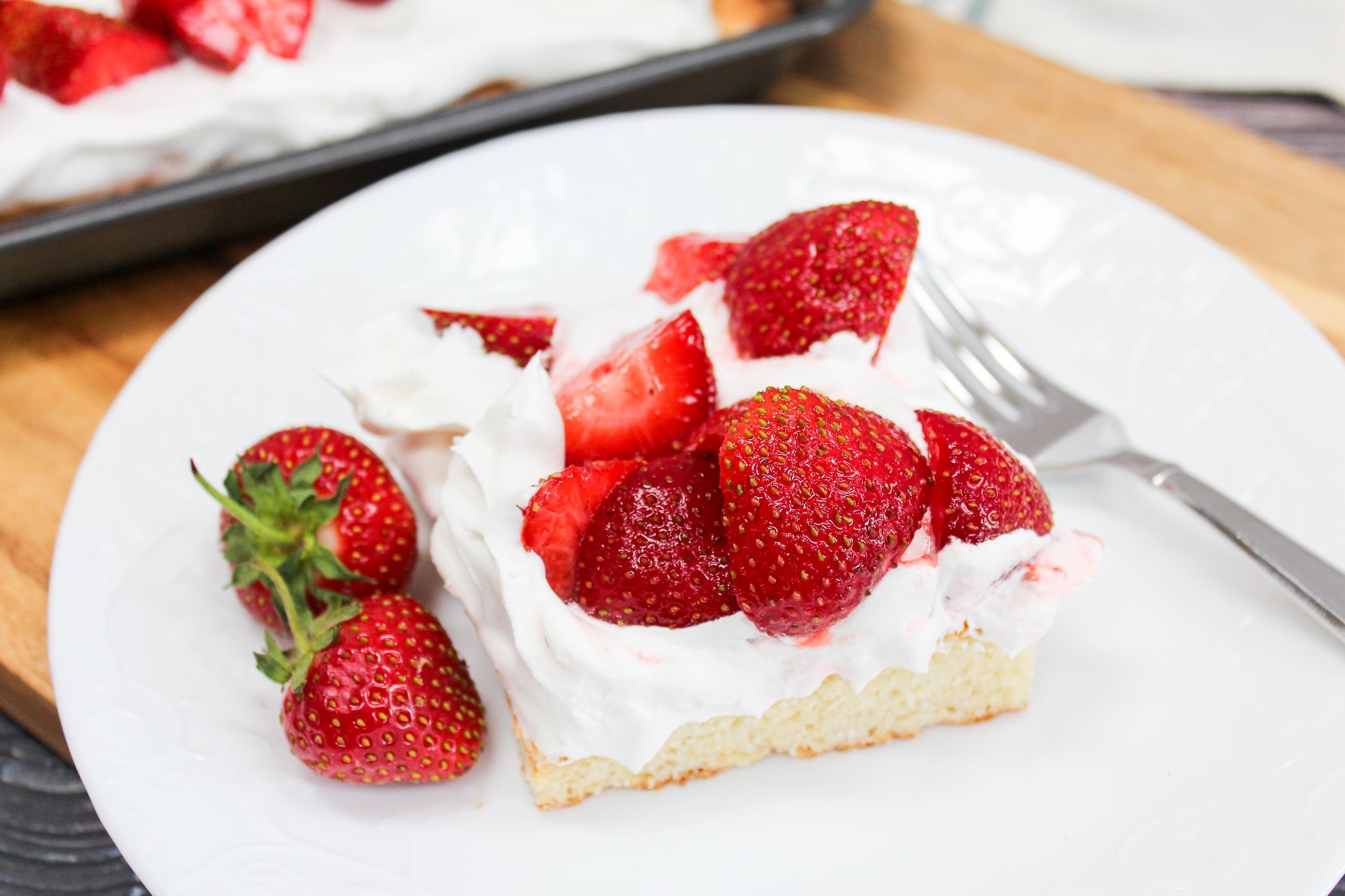 cake with toppings on a white plate