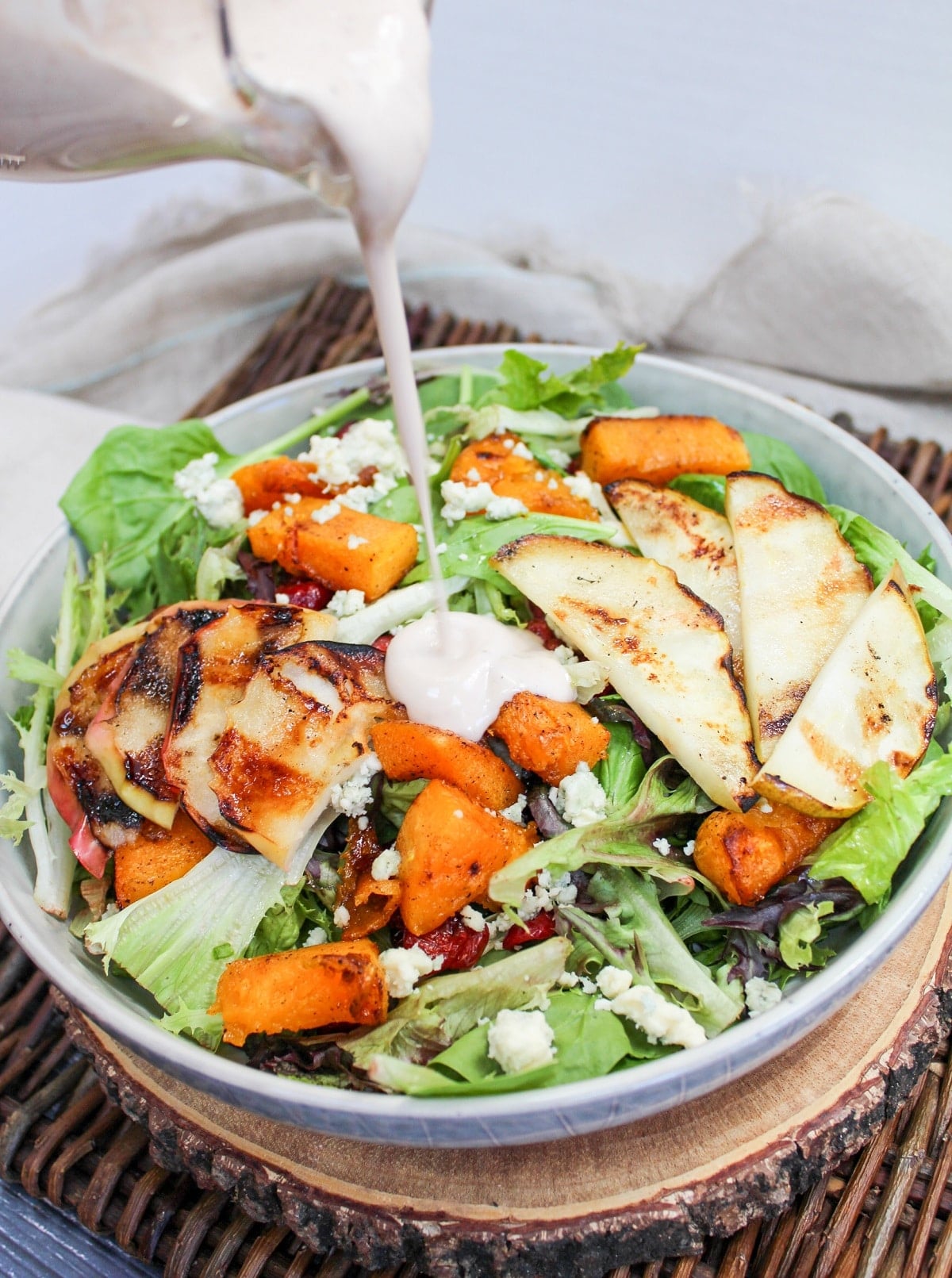 salad with dressing poured on top