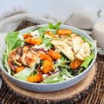 salad in a bowl with grilled apples and pears