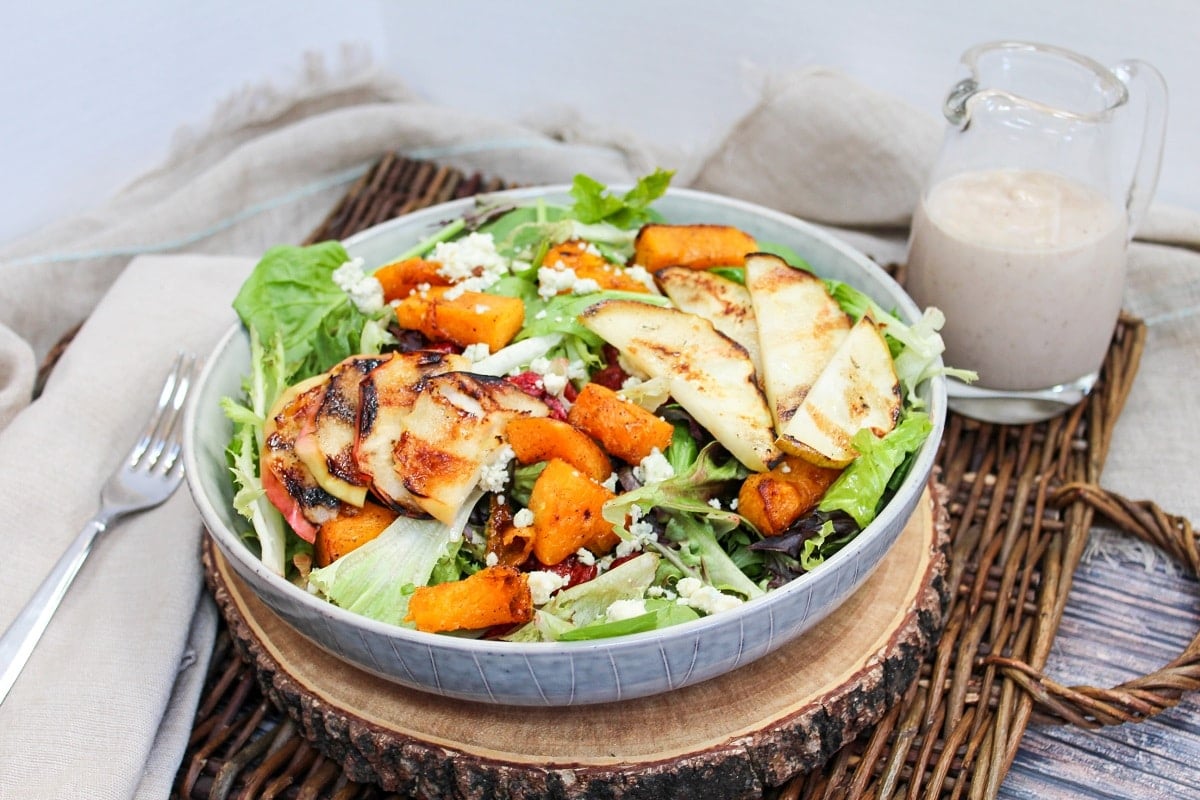 salad in a bowl with grilled apples and pears